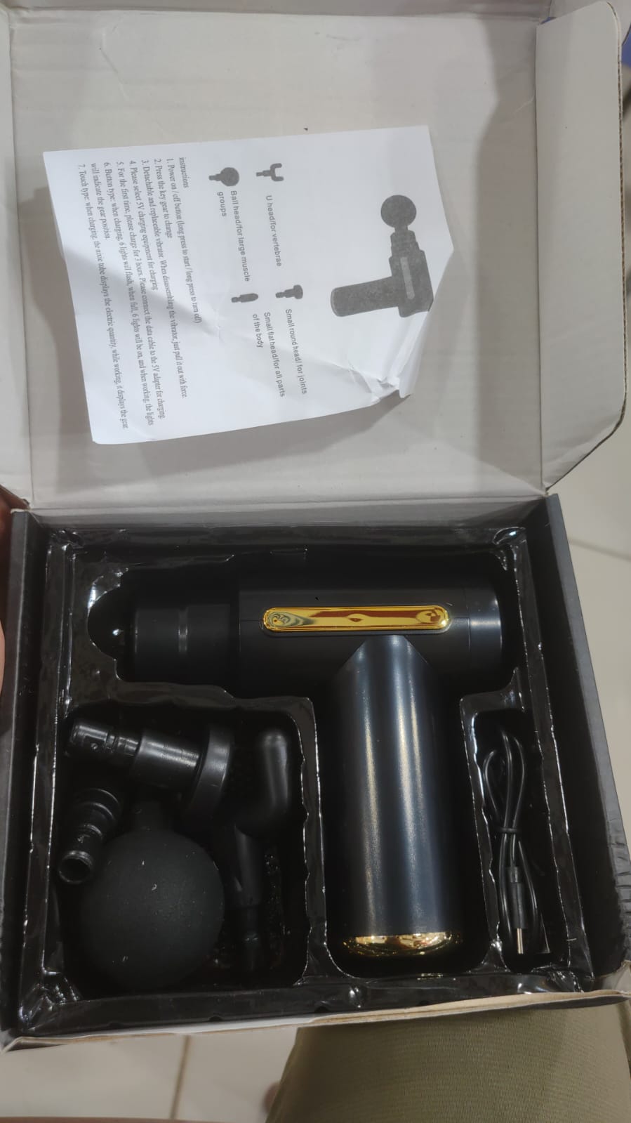 Massal Massager Portable Deep Tissue Body Massage Machine in box with tools and instructions.